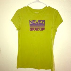 a green tek gear shirt